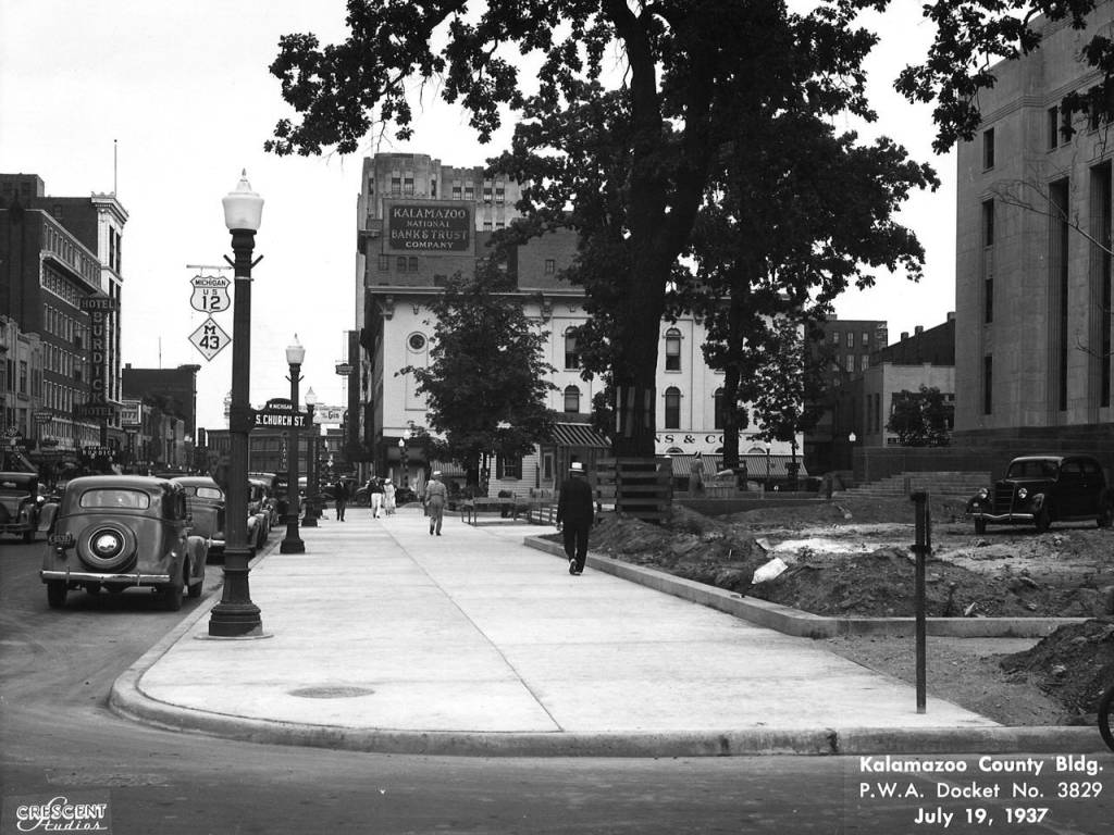 Historic downtown Kalamazoo near the Kalamazoo County Building in 1937 during the era of housing segregation and redlining policies.